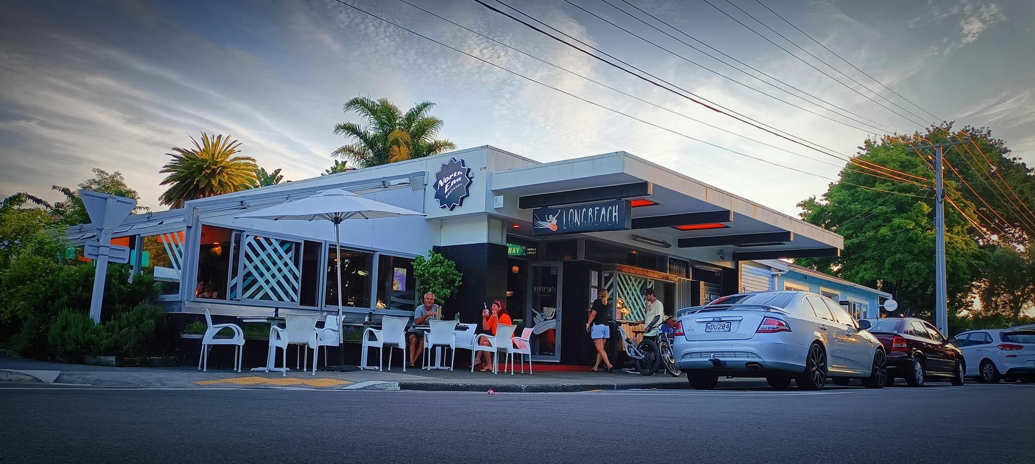 Waikanae Beach electrician installing coastal-rated outdoor lighting on a bach near Tutere Street and the Waimanu Lagoons